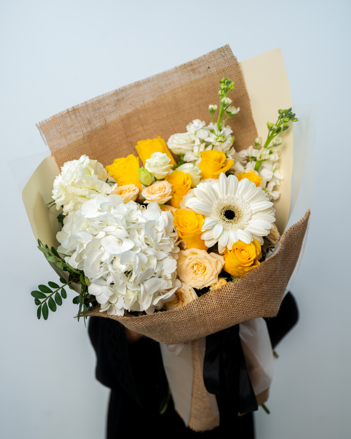 Elegant Sunshine Kiss flower bouquet prepared for flower shop in Dubai