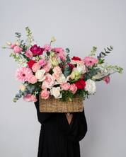 Pink Pearl flower basket featuring fresh flowers, handcrafted by a flower shop in Dubai