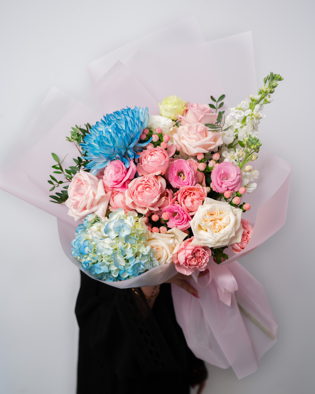 Pastel candy flower bouquet from a flower shop in Dubai with soft pink and pastel blooms