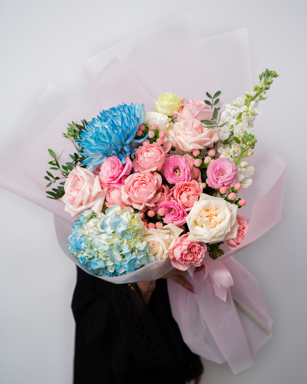Pastel candy flower bouquet arranged by a premium flower shop in Dubai